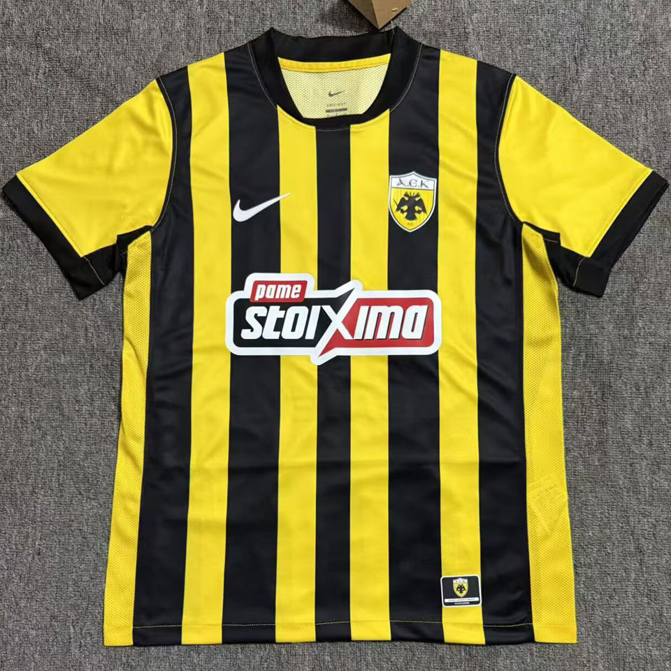jersey 2025/26 aek athens local manga corta versión fan